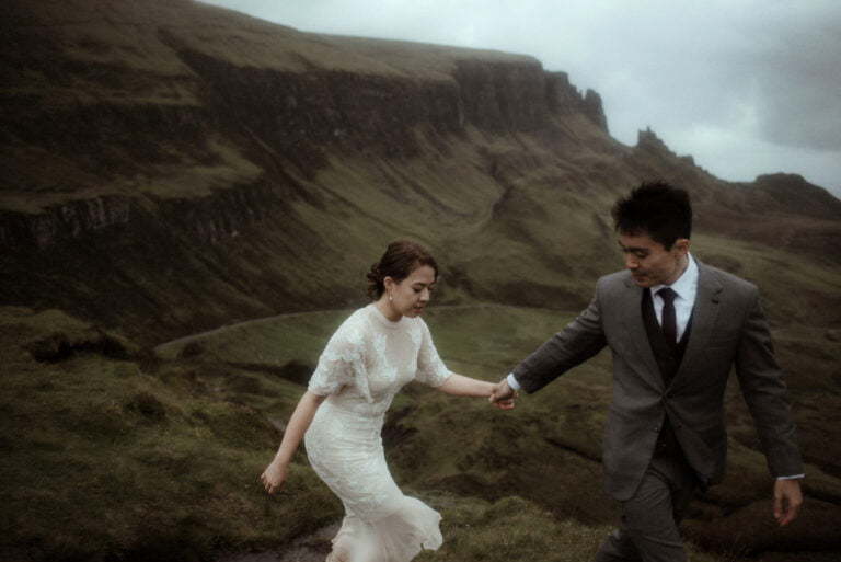 Couple walking on the Isle of Skye after their elopement in Scotland