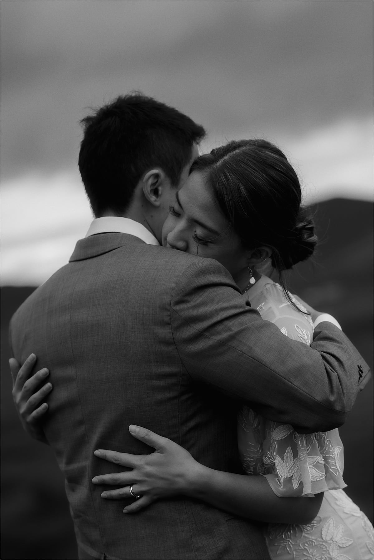 couple hugging during their isle of skye elopement