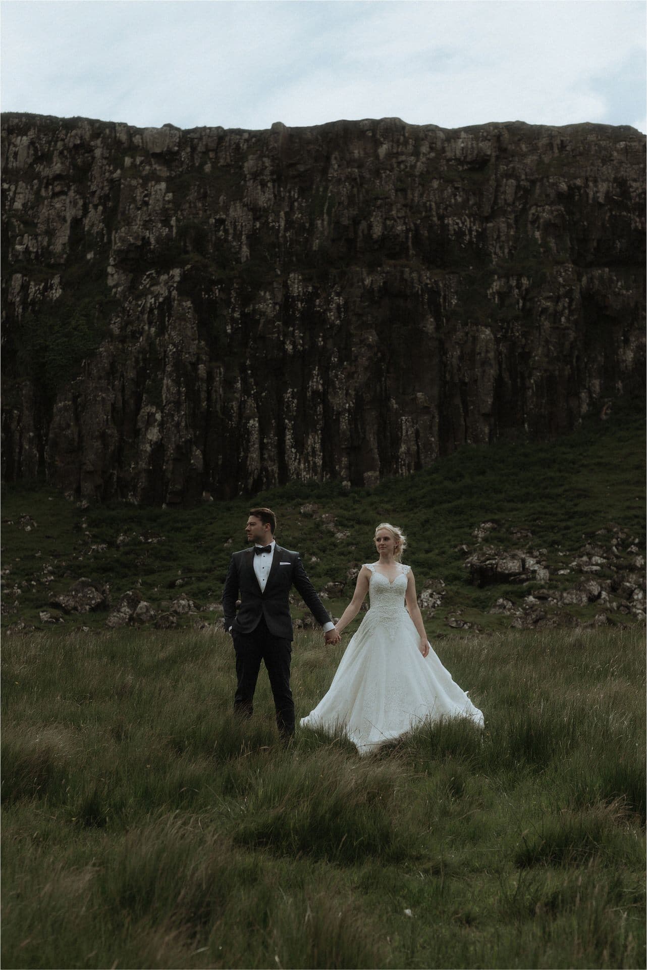 elope in scotland couple walking in fairy glen on isle of skye