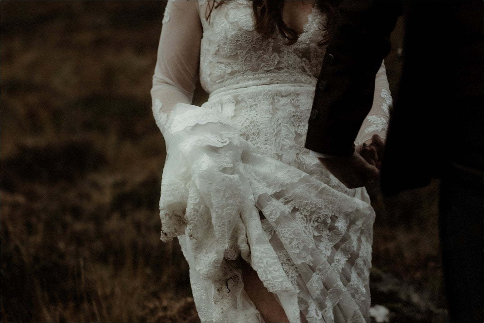detail of brides dress in scottish elopement