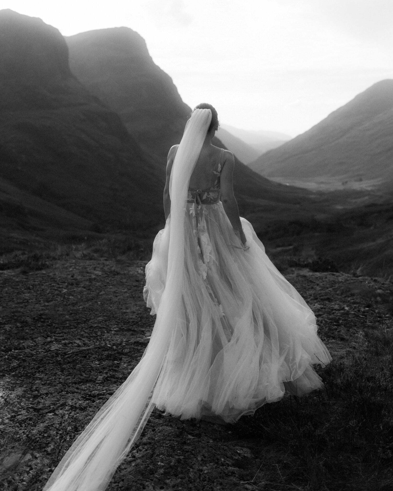 glencoe elopeemnt bride wandering the mountains