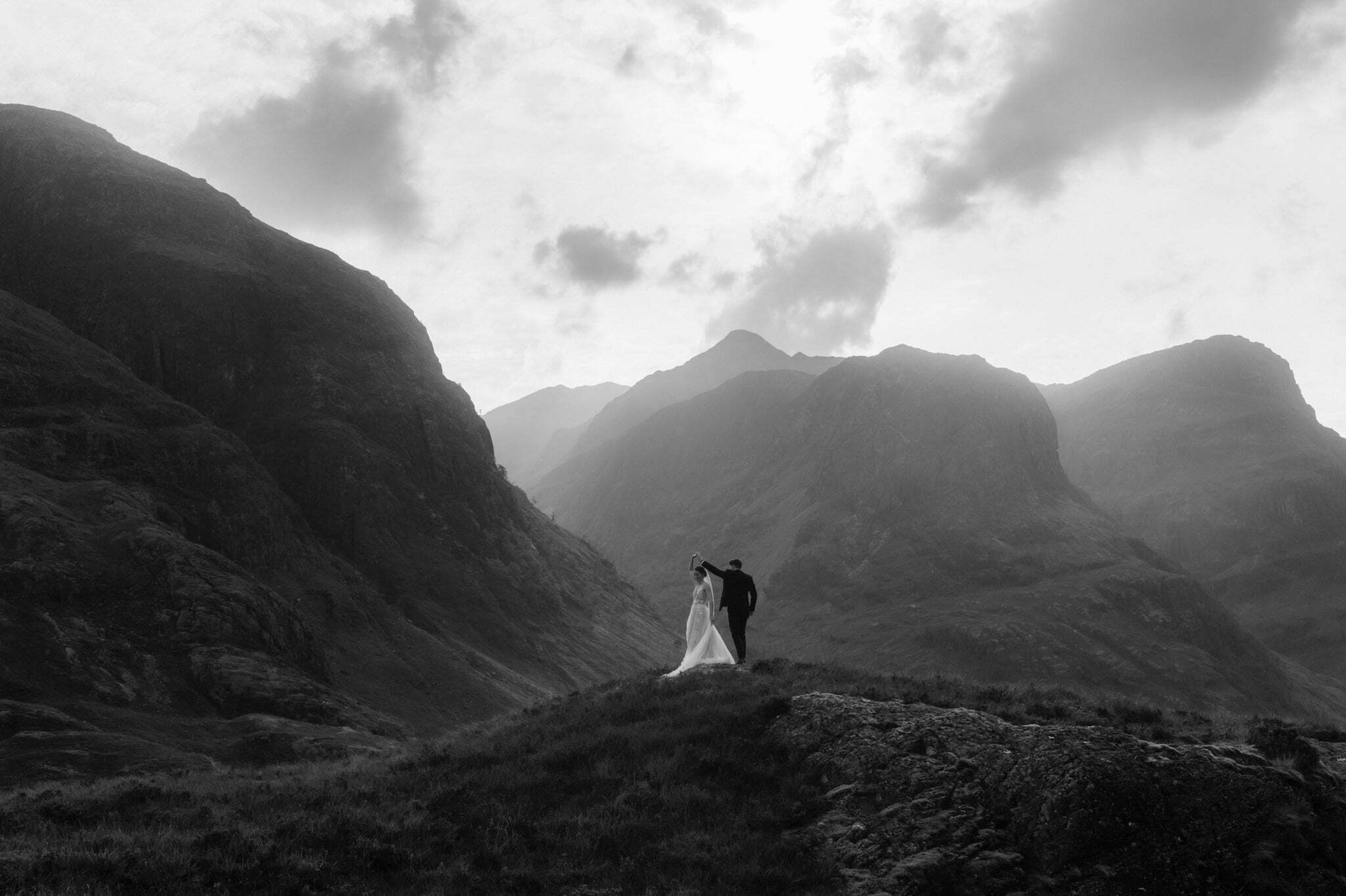Glencoe elopement couple dancing in the mountains