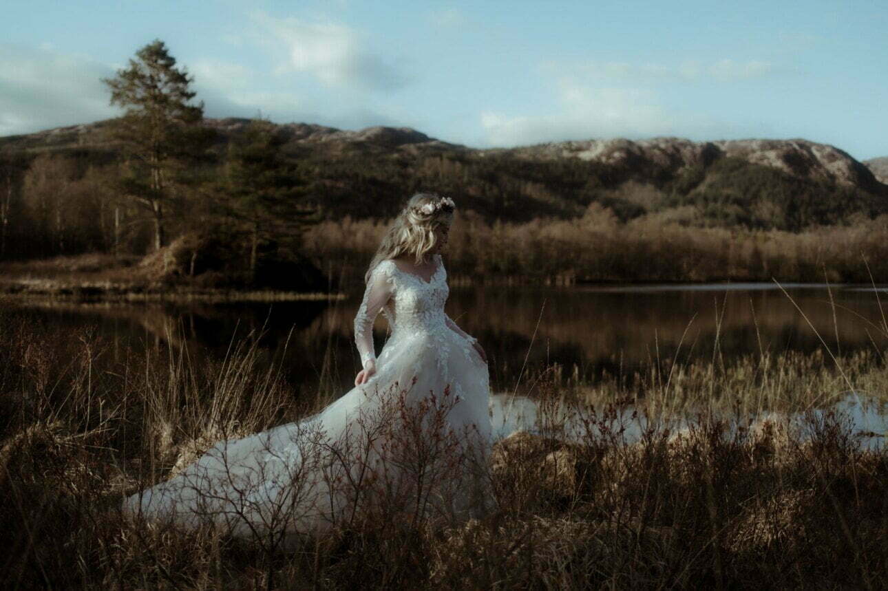 elope to scotland bride walking near Loch Trool