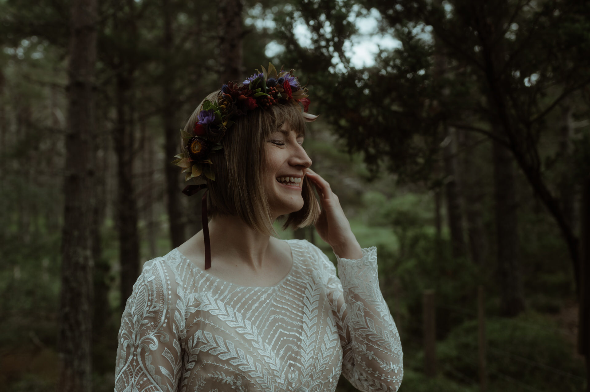 Bride laughing during a Scottish elopement
