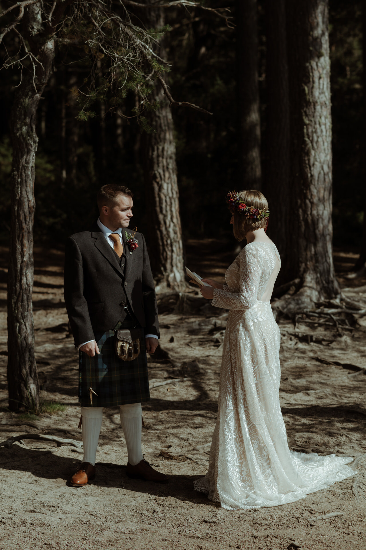 Bride saying her vows during ceremony wedding at Loch Garten.