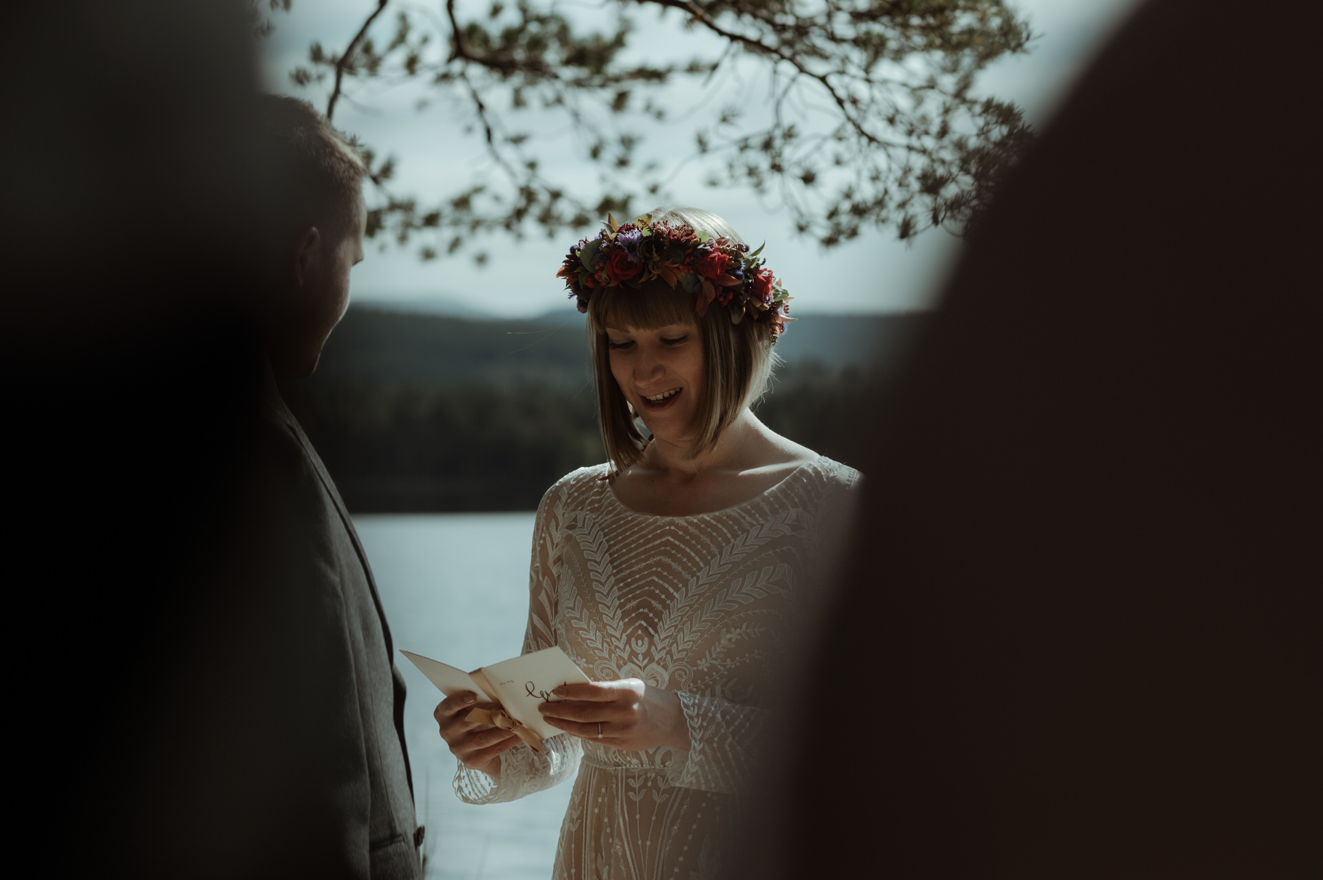 Bride saying her vows during ceremony wedding at Loch Garten.