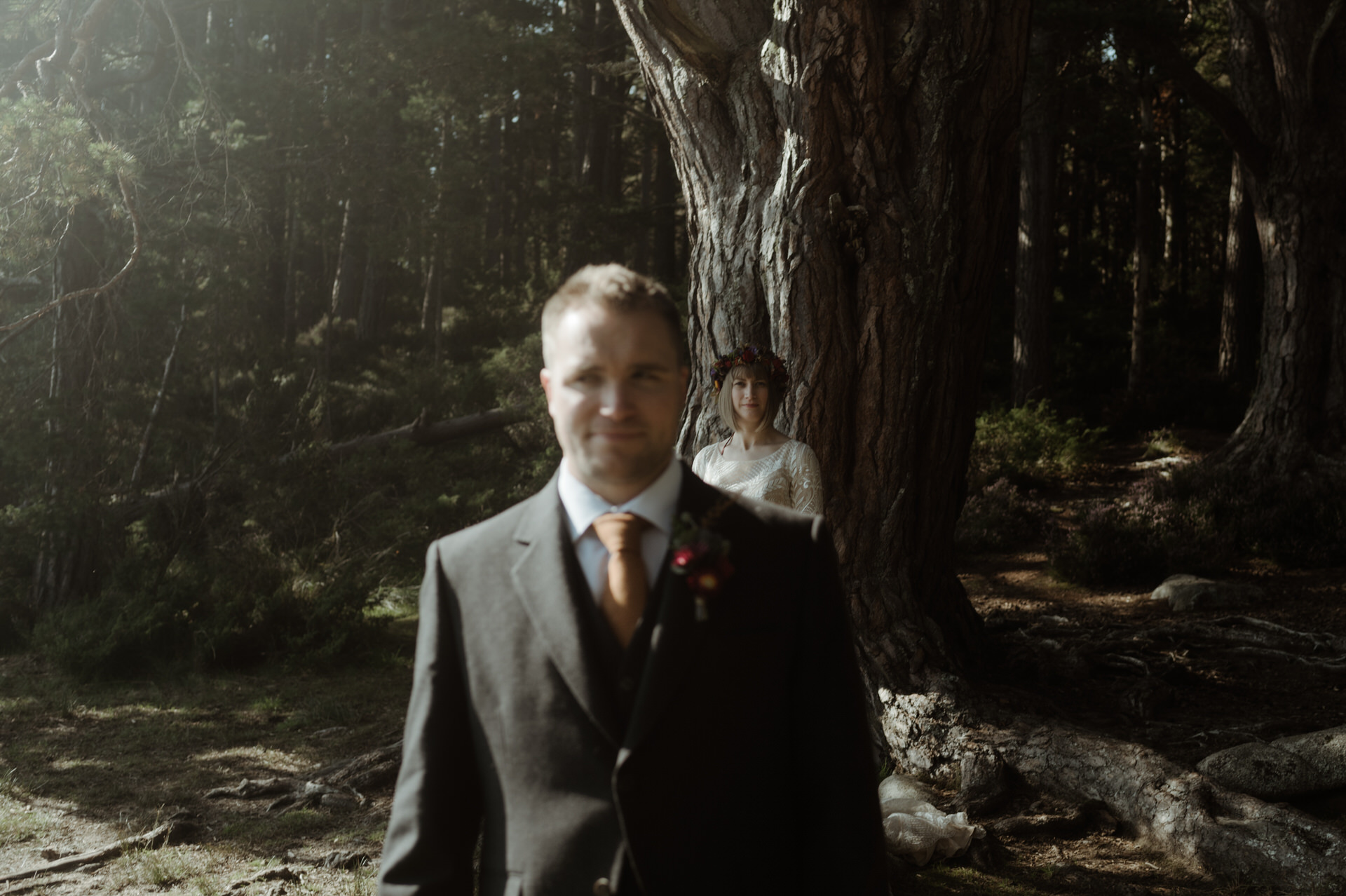 Bride and Groom in Woodland in the Cairngorm's national park on a Sunny day during their elopement