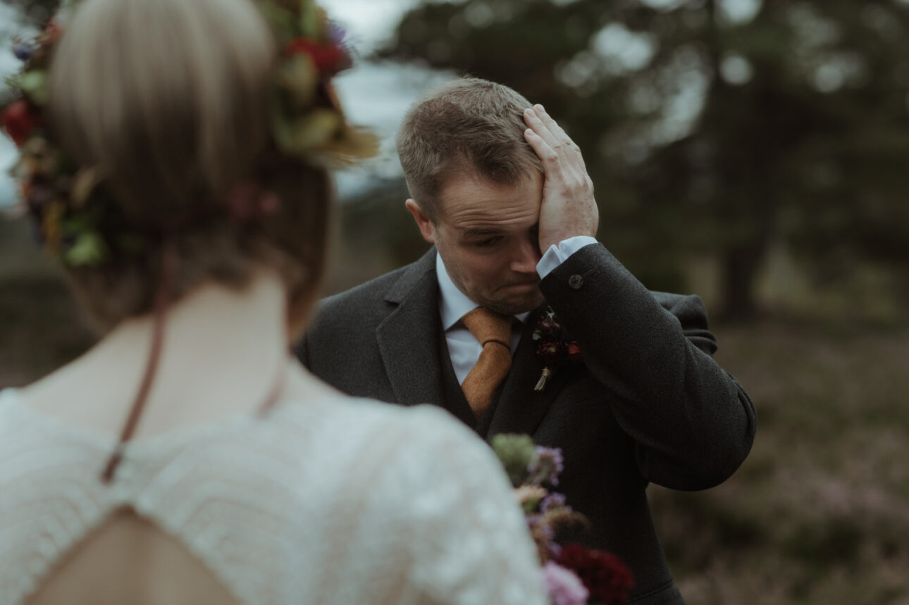 A first look between bride and groom during their Scotland elopement