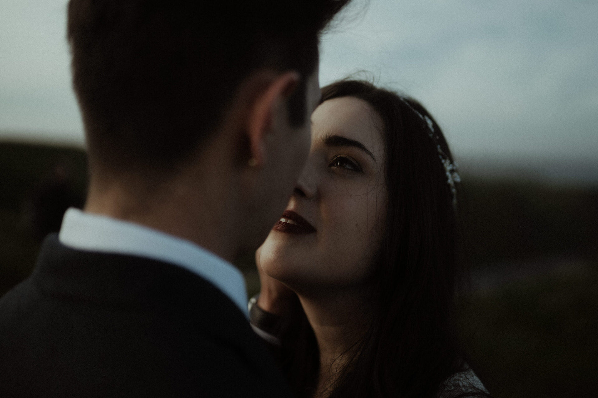 scotland elopement couple standing together at duntottar castle